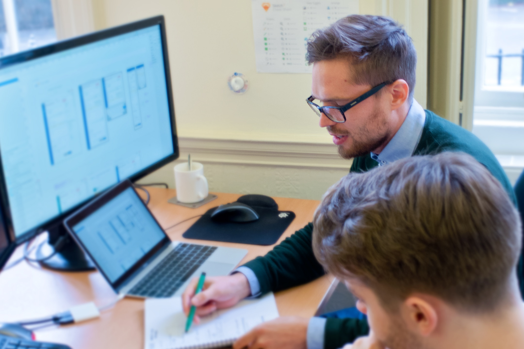 Me deciding on the content with a fellow worker